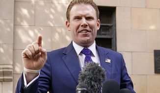 In this April 28, 2021 file photo, Andrew Giuliani, son of former New York Mayor Rudy Giuliani, speaks to reporters outside the building where his father lives, in New York. Andrew Giuliani announced Tuesday, May 18, 2021, that he is seeking the Republican nomination for governor of New York, potentially setting up a battle with third-term incumbent Democrat Andrew Cuomo.(AP Photo/Mary Altaffer, File)