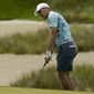 Jordan Spieth chips to the green on the 16th hole during a practice round at the PGA Championship golf tournament on the Ocean Course Tuesday, May 18, 2021, in Kiawah Island, S.C. (AP Photo/Matt York)
