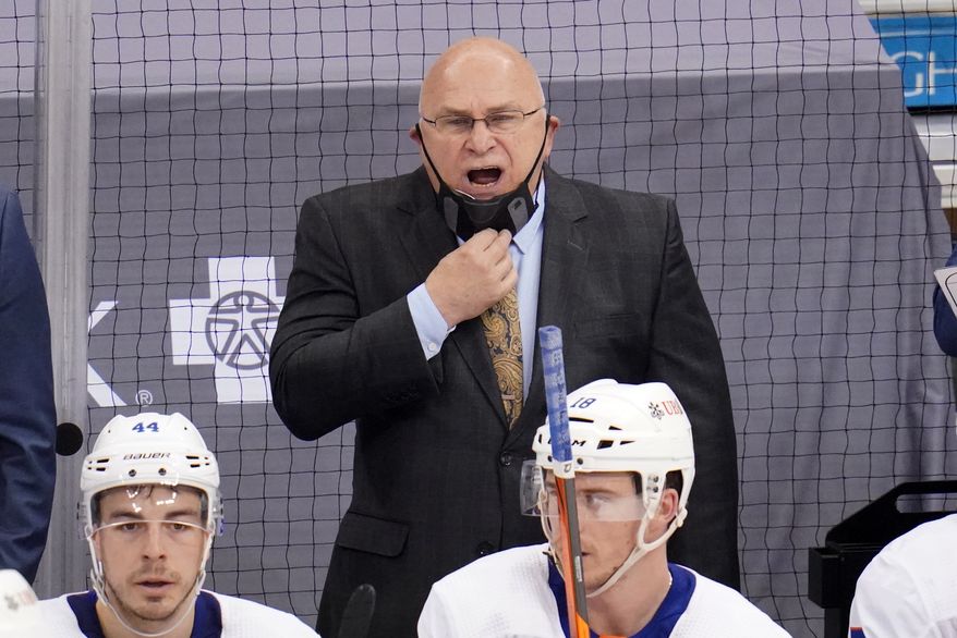 New York Islanders head coach Barry Trotz yells instructions during the third period in Game 2 of an NHL hockey Stanley Cup first-round playoff series against the Pittsburgh Penguins in Pittsburgh, Tuesday, May 18, 2021. The Penguins won 2-1. (AP Photo/Gene J. Puskar)