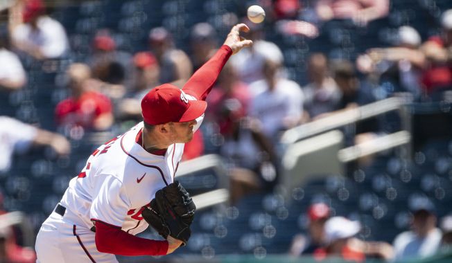 Washington Nationals starting pitcher Patrick Corbin delivers during the first inning of a baseball game against the Baltimore Orioles, Sunday, May 23, 2021, in Washington. (AP Photo/Al Drago)