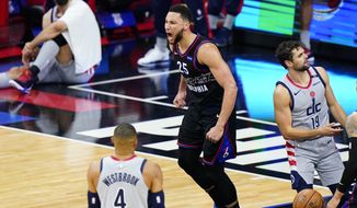 Philadelphia 76ers&#39; Ben Simmons reacts after a dunk during the second half of Game 1 of a first-round NBA basketball playoff series against the Washington Wizards, Sunday, May 23, 2021, in Philadelphia. (AP Photo/Matt Slocum)