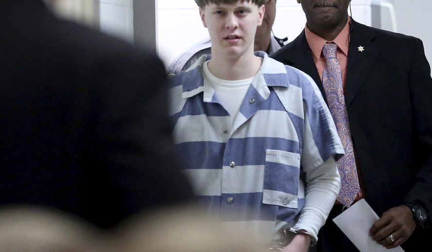 In this April 10, 2017, file photo, Dylann Roof enters the courtroom at the Charleston County Judicial Center in Charleston, S.C. (Grace Beahm/The Post And Courier via AP, Pool, File)