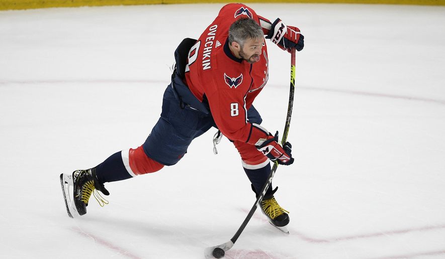 Washington Capitals left wing Alex Ovechkin warms up before Game 5 of an NHL hockey Stanley Cup first-round playoff series against the Boston Bruins, Sunday, May 23, 2021, in Washington. (AP Photo/Nick Wass)