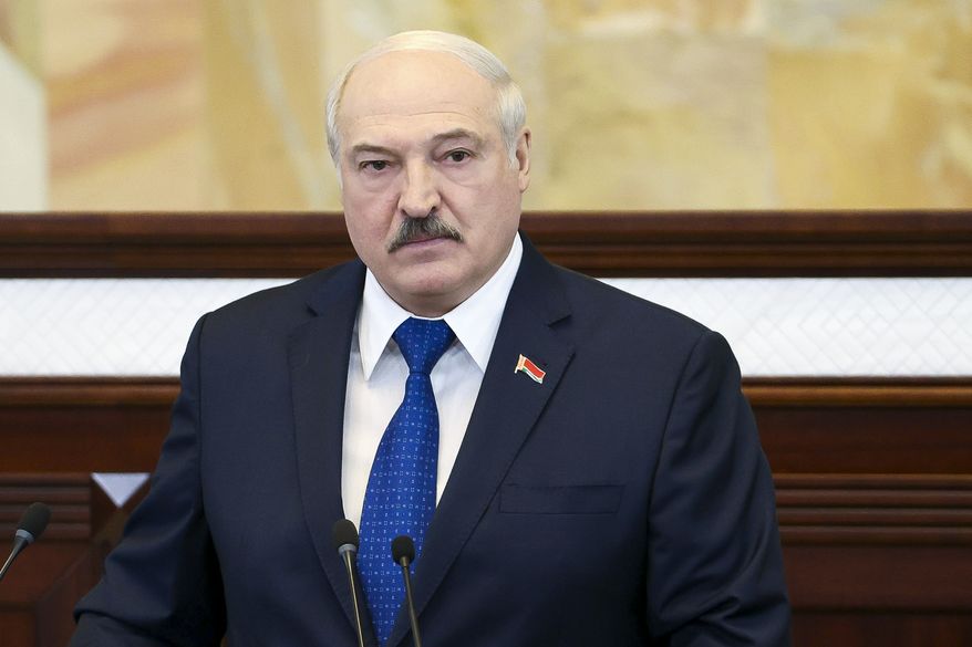 Belarusian President Alexander Lukashenko addresses the Parliament in Minsk, Belarus, Wednesday, May 26, 2021. Lukashenko is defending his action to divert a European flight that triggered bruising European Union sanctions and accused the West of waging a &quot;hybrid war&quot; to &quot;strangle&quot; the ex-Soviet nation. On Sunday, May 23, 2021, Belarusian flight controllers ordered a Ryanair jetliner flying from Greece to Vilnius to land in the country&#x27;s capital, Minsk because of a bomb threat and a Belarusian fighter jet was scrambled to escort the plane. (Sergei Shelega/BelTA Pool Photo via AP)