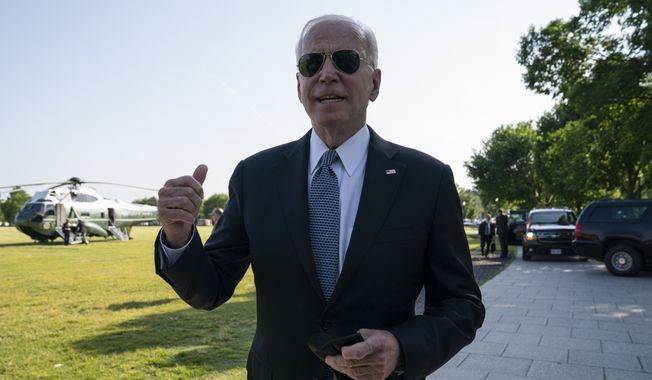 President Joe Biden talks with reporters before boarding Marine One for a trip to Delaware, Tuesday, May 25, 2021, in Washington. (AP Photo/Evan Vucci)