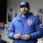 In this Sunday, April 28, 2019, file photo, then-New York Mets manager Mickey Callaway stands by the dugout before a baseball game against the Milwaukee Brewers at Citi Field, in New York. Former New York Mets manager Mickey Callaway was suspended by Major League Baseball on Wednesday, May 26, 2021 through at least the end of the 2022 season following an investigation of sexual harassment allegations. (AP Photo/Seth Wenig, File) **FILE**