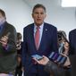 Sen. Joe Manchin, D-W.Va., is surrounded by reporters as senators rush to the chamber for votes ahead of the approaching Memorial Day recess, at the Capitol in Washington, Wednesday, May 26, 2021. Lawmakers still face standoffs on an infrastructure bill, police reform, voting rights, and a bipartisan commission to investigate the Jan. 6 attack on the Capitol. (AP Photo/J. Scott Applewhite) **FILE**