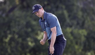 Jordan Spieth pumps his fist after his birdie putt on the 18th green during the third round of the Charles Schwab Challenge golf tournament at Colonial Country Club in Fort Worth, Texas, Saturday, May 29, 2021. (AP Photo/Ron Jenkins)