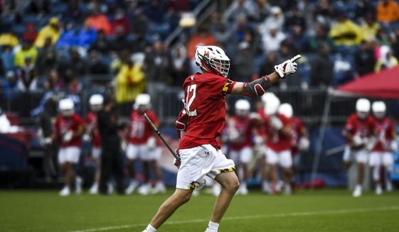 Maryland&#39;s Logan Wisnauskas (12) celebrates a goal against Duke in the semifinals of men&#39;s NCAA Division I college lacrosse tournament at Pratt &amp;amp; Whitney Stadium at Rentschler Field Saturday, May 29, 2021, in East Hartford, Conn. (Kassi Jackson/Hartford Courant via AP) **FILE**