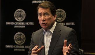 U.S. Sen. Bill Hagerty gestures as he speaks during an interview with The Associated Press in Jerusalem, Monday, May 31, 2021. (AP Photo/Sebastian Scheiner) ** FILE **
