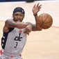 Washington Wizards guard Bradley Beal (3) passes during the first half of Game 4 in a first-round NBA basketball playoff series against the Philadelphia 76ers, Monday, May 31, 2021, in Washington. (AP Photo/Nick Wass)