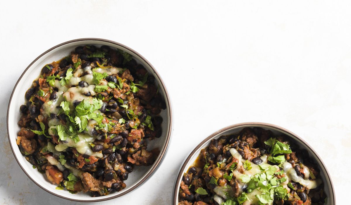 NextImg:Black bean stew with chorizo: Canned black beans speed a hearty stew