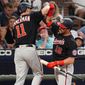 Washington Nationals&#39; Ryan Zimmerman (11) celebrates with Kyle Schwarber (12) after hitting a two-run home run in the fourth inning of a baseball game against the Atlanta Braves Tuesday, June 1, 2021, in Atlanta. (AP Photo/John Bazemore)