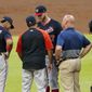 Washington Nationals starting pitcher Stephen Strasburg, center, talks with manager Dave Martinez and a member of the team&#x27;s medical staff before exiting a baseball game in then second inning against Atlanta Braves Tuesday, June 1, 2021, in Atlanta. (AP Photo/John Bazemore) **FILE**