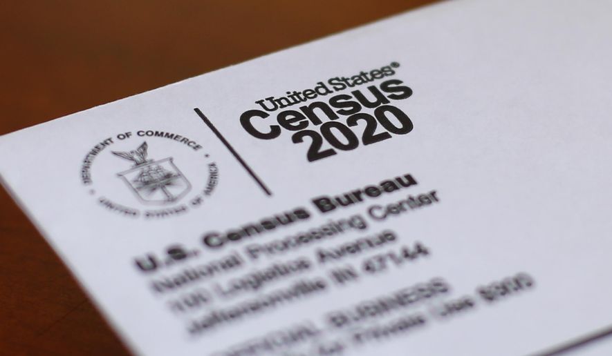 FILE - This April 5, 2020, photo shows an envelope containing a 2020 census letter mailed to a U.S. resident in Detroit. A group of Harvard researchers are coming out against the U.S. Census Bureau&#39;s use of a controversial privacy method on the numbers used for redrawing congressional and legislative districts, saying it doesn&#39;t produce data that are good enough for redistricting. (AP Photo/Paul Sancya, File)