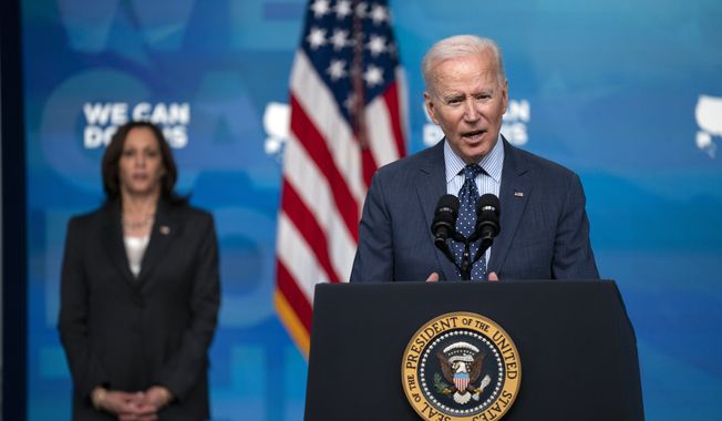 Vice President Kamala Harris listens as President Joe Biden speaks about the COVID-19 vaccination program, in the South Court Auditorium on the White House campus, Wednesday, June 2, 2021, in Washington. (AP Photo/Evan Vucci) **FILE**