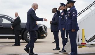 President Joe Biden boards Air Force One to return to Washington after speaking to commemorate the 100th anniversary of the Tulsa race massacre, at the Greenwood Cultural Center, Tuesday, June 1, 2021, in Tulsa. (AP Photo/Evan Vucci)