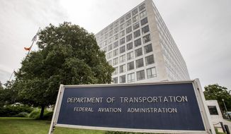 In this June 19, 2015 file photo, Department of Transportation Federal Aviation Administration building is seen in Washington.  The Federal Aviation Administration said Wednesday, June 2, 2021 that Ali Bahrami, the head of FAA&#39;s aviation safety office, will step down at the end of June. Bahrami was among FAA officials who were criticized by lawmakers and relatives of passengers on Boeing Max jets that crashed.  (AP Photo/Andrew Harnik, File)