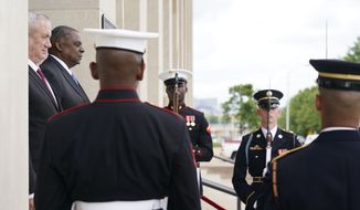 Secretary of Defense Lloyd Austin hosts an honor cordon welcoming Israeli Defense Minister Benny Gantz at the Pentagon in Washington, Thursday, June 3, 2021. (AP Photo/Andrew Harnik) **FILE**