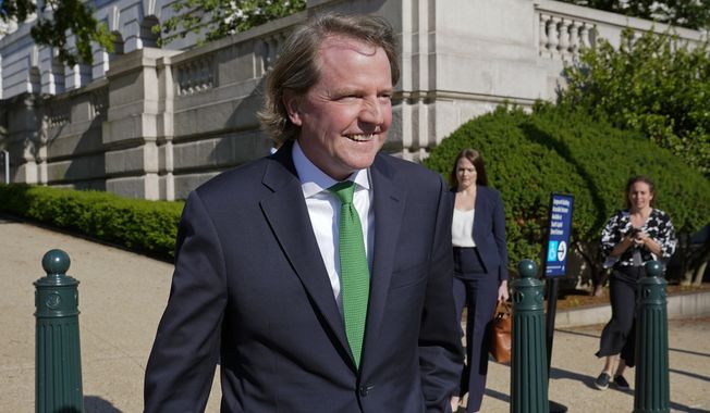 Former White House counsel Don McGahn departs after appearing for questioning behind closed doors by the House Judiciary Committee on Capitol Hill in Washington, Friday, June 4, 2021. (AP Photo/Patrick Semansky)