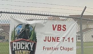 The Military Religious Freedom Foundation took credit for forcing the removal of a banner advertising a Vacation Bible School program, which bore the slogan, &quot;Jesus Pulls Us Through,&quot; from the main gate at the Fort Sill Army Base in Oklahoma. (Photo courtesy of MRFF)