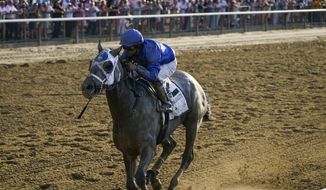 Essential Quality (2), with jockey Luis Saez up, crosses the finish line to win the 153rd running of the Belmont Stakes horse race, Saturday, June 5, 2021, at Belmont Park in Elmont, N.Y. (AP Photo/Seth Wenig) **FILE**