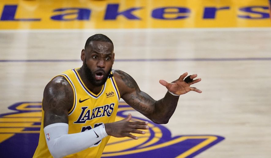 Los Angeles Lakers forward LeBron James (23) reacts to a call during Game 6 of an NBA basketball first-round playoff series against the Phoenix Suns Thursday, Jun 3, 2021, in Los Angeles. (AP Photo/Ashley Landis) **FILE**
