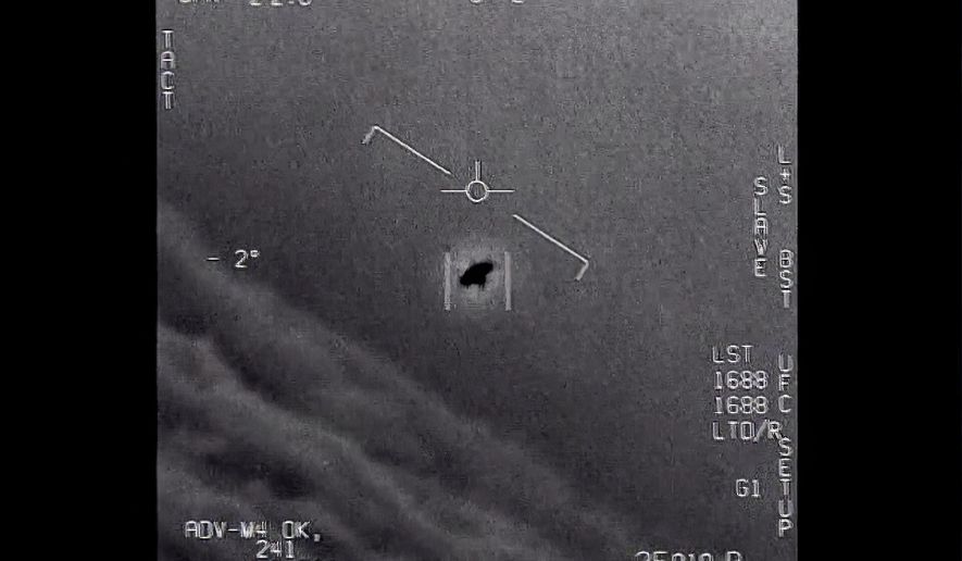 The image from video provided by the Department of Defense labelled Gimbal, from 2015, an unexplained object is seen at center as it is tracked as it soars high along the clouds, traveling against the wind. “There&#x27;s a whole fleet of them,” one naval aviator tells another, though only one indistinct object is shown. “It&#x27;s rotating.&amp;quot; The U.S. government has been taking a hard look at unidentified flying objects, under orders from Congress, and a report summarizing what officials know is expected to come out in June 2021. (Department of Defense via AP)