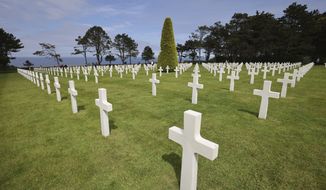 General view of headstones in the US cemetery of Colleville-sur-Mer, Normandy, Sunday, June, 6 2021. Several ceremonies took place on Sunday to commemorate the 77th anniversary of D-Day that led to the liberation of France and Europe from the German occupation. (AP Photo/David Vincent)