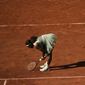 United States Serena Williams reacts after missing a shot as she plays against Kazakhstan&#x27;s Elena Rybakina during their fourth round match on day 8, of the French Open tennis tournament at Roland Garros in Paris, France, Sunday, June 6, 2021. (AP Photo/Thibault Camus)