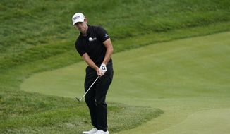 Patrick Cantlay hits to the fourth green during the final round of the Memorial golf tournament, Sunday, June 6, 2021, in Dublin, Ohio. (AP Photo/Darron Cummings)