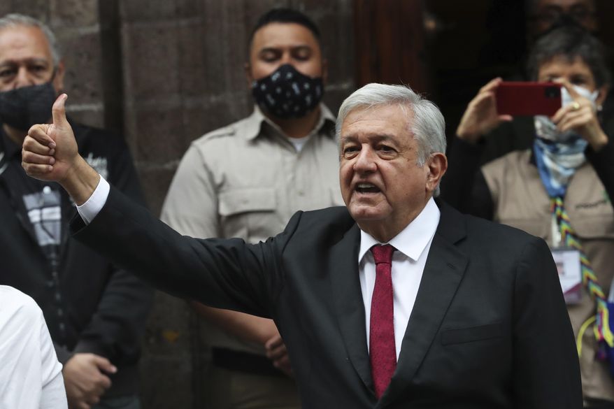 Mexico&#x27;s President Andres Manuel Lopez Obrador thumbs up after voting in congressional, state and local elections in Mexico City, Sunday, June 6, 2021. Mexicans on Sunday were electing the entire lower house of Congress, almost half the country&#x27;s governors and most mayors in a vote that will determine if  Obrador&#x27;s Morena party gets the legislative majority. (AP Photo/Marco Ugarte)