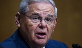 Sen. Bob Menendez, D-N.J., speaks during a Senate Finance Committee hearing on the IRS budget request on Capitol Hill in Washington, Tuesday, June 8, 2021. (Tom Williams/Pool via AP) **FILE**