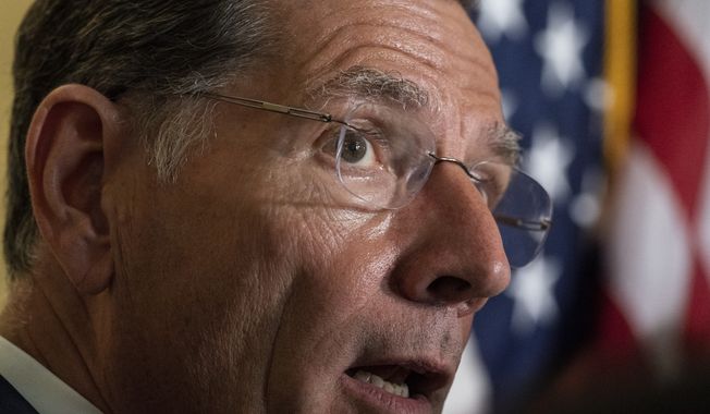 Sen. John Barrasso, R-Wyo., speaks with reporters after a Republican caucus luncheon on Capitol Hill, Tuesday, June 8, 2021, in Washington. (AP Photo/Alex Brandon) **FILE**