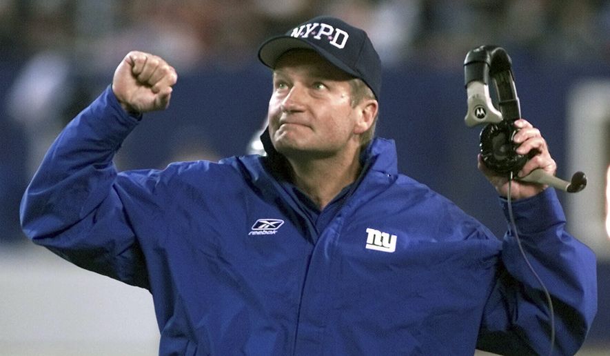 New York Giants head coach Jim Fassel reacts after referees overturned a ruling on a completed Philadelphia Eagles pass in the fourth quarter at Giants Stadium in East Rutherford, N.J., in this Monday, Oct. 22, 2001, file photo. Fassel, a former coach of the New York Giants who was named NFL coach of the year in 1997 and led the team to the 2001 Super Bowl, has died. He was 71. Fassel&#39;s son, John, confirmed the death to the Los Angeles Times on Monday, June 7, 2021. According to the Los Angeles Times, Fassel was taken to a hospital in Las Vegas with chest pains and died of a heart attack. (AP Photo/Jeff Zelevansky, File) **FILE**