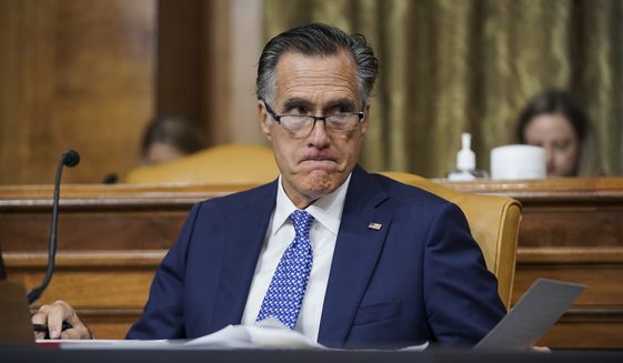 Sen. Mitt Romney, R-Utah, attends a Senate Budget Committee hearing to discuss President Joe Biden&#x27;s budget request for FY 2022 on Tuesday, June 8, 2021, on Capitol Hill in Washington. (Greg Nash/Pool via AP) ** FILE **