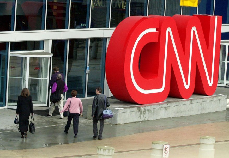 Pople entering CNN Center, the headquarters for CNN, in downtown Atlanta. (AP Photo/Ric Feld, File)