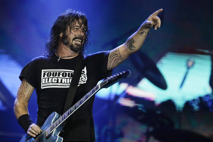 In this Sept. 29, 2019, file photo, Dave Grohl of the band Foo Fighters performs at the Rock in Rio music festival in Rio de Janeiro, Brazil. (AP Photo/Leo Correa, File)