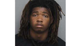This photo provided by Blacksburg Police Dept., shows Isimemen Etute.   Etute, a Virginia Tech freshman linebacker charged with second-degree murder,  fatally beat his victim after discovering that the person, whom he met on Tinder as “Angie,” was a man, prosecutors said Wednesday, June 9, 2021.  (Blacksburg Police via AP)