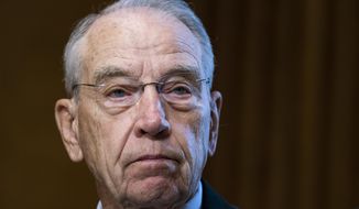 In this Tuesday, June 8, 2021, photo, Sen. Chuck Grassley, R-Iowa, listens during a Senate Finance Committee hearing on the IRS budget request on Capitol Hill in Washington. (Tom Williams/Pool via AP) **FILE**