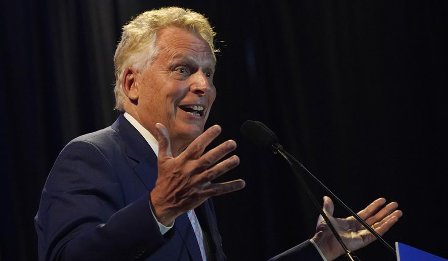 Winner of the Virginia Democratic gubernatorial primary, former Virginia Gov. Terry McAuliffe, gestures as he addresses the crowd during an election party in McLean, Va., Tuesday, June 8, 2021. McAuliffe faced four other Democrats in Tuesday&#x27;s primary. (AP Photo/Steve Helber)