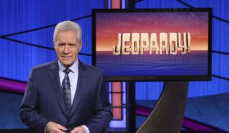 This image released by Jeopardy! shows Alex Trebek, host of the game show &#39;;Jeopardy!&#39; Filling the void left by Trebek after 37 years involves sophisticated research and a parade of guest hosts doing their best to impress viewers and the studio that will make the call.  (Jeopardy! via AP)