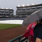 Fans gather to leave a postponed baseball game between the Washington Nationals and the San Francisco Giants at Nationals Park, Thursday, June 10, 2021, in Washington. The game was postponed until Saturday, June 12th. (AP Photo/Alex Brandon) ** FILE **