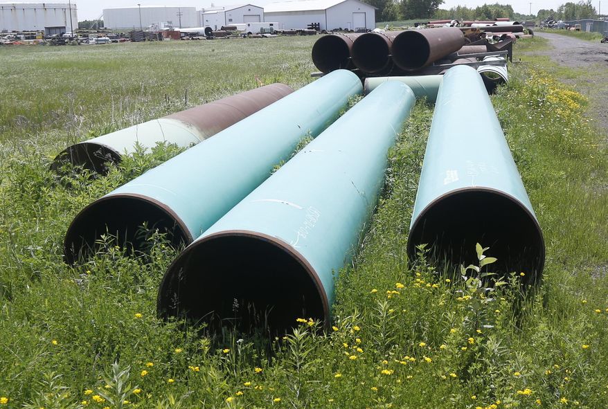 In this June 29, 2018, file photo, pipeline used to carry crude oil is shown at the Superior, Wis., terminal of Enbridge Energy. A federal judge dismissed Thursday a multi-state lawsuit challenging President Biden&#39;s cancellation of the Keystone XL pipeline, ruling that the company&#39;s subsequent decision to kill the project renders the legal battle moot. (AP Photo/Jim Mone, File)