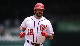 Washington Nationals&#x27; Kyle Schwarber rounds the bases after his home run during the first inning of a baseball game against the San Francisco Giants, Sunday, June 13, 2021, in Washington. (AP Photo/Nick Wass)
