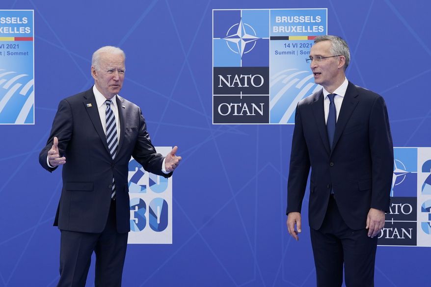 President Joe Biden is greeted by NATO Secretary-General Jens Stoltenberg at the NATO summit at NATO headquarters in Brussels, Monday, June 14, 2021. (AP Photo/Patrick Semansky, Pool)
