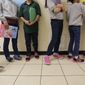 In this Aug. 29, 2019, photo, migrant teens line up for a class at a &amp;quot;tender-age&amp;quot; facility for babies, children and teens, in Texas&#39; Rio Grande Valley, in San Benito, Texas. A federal volunteer at the Biden administration&#39;s largest shelter for unaccompanied immigrant children says paramedics were called regularly during her the two weeks she worked there. She said panic attacks would occur often after some of the children were taken away to be reunited with their families, dashing the hopes of those left behind. The conditions described by the volunteer highlight the stress of children who cross the U.S.-Mexico border alone and now find themselves held at unlicensed mass-scale facilities waiting to reunite with relatives. (AP Photo/Eric Gay) **FILE**