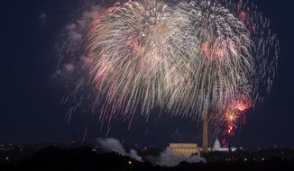 In this Saturday, July 4, 2020, file photo, Fourth of July fireworks explode over the Lincoln Memorial, the Washington Monument and the U.S. Capitol along the National Mall in Washington. (AP Photo/Cliff Owen, File)