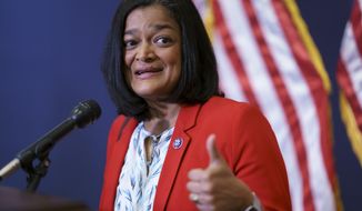 Rep. Pramila Jayapal, D-Wash., chair of the Congressional Progressive Caucus, pauses for reporters after a meeting of the House Democratic Caucus and Biden administration officials to discuss progress on an infrastructure bill, at the Capitol in Washington, Tuesday, June 15, 2021. (AP Photo/J. Scott Applewhite)