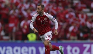 Denmark&#39;s Christian Eriksen runs during the Euro 2020 soccer championship group B match between Denmark and Finland at Parken stadium in Copenhagen, Denmark, Saturday, June 12, 2021. Eriksen collapsed on the pitch and received medical assistance before being taken to hospital. (Wolfgang Rattay/Pool via AP) **FILE**